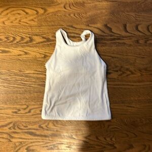 Athleta girl: white tank top, with built in bra, size medium (7/8).